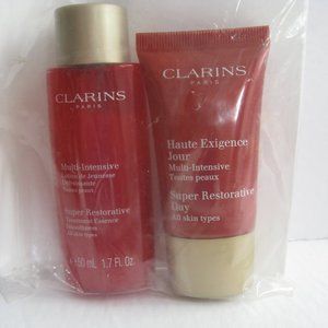 2pc Clarins Super Restorative Treatment Essence 1.7oz & Day Cream 0.5oz NEW